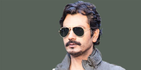 Bollywood actor Nawazuddin Siddiqui was seen wearing Ray-Ban Aviator 3025 L0205 Gold/G15 Green sunglasses