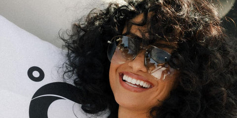 Nazanin Mandi was seen wearing silver Saint Laurent Sun Classic 11 M 005 aviator sunglasses at the Coachella Music Festival 2024.