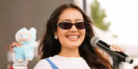 Indian playback singer Neha Kakkar was seen wearing black Gucci GG1680S 001 sunglasses.