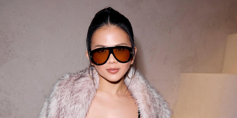 Thai businesswoman and talent manager Nichapat Suphap was seen wearing black Tom Ford Bronson TF1044 01E sunglasses with yellow lenses at the Emporio Armani Spring/Summer 2026 fashion show during Milan Fashion Week. Shop online now on Pretavoir