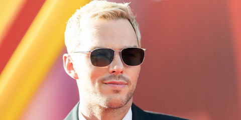 Nicholas Hoult was seen wearing silver Saint Laurent SL 796 Vincent 002 aviator sunglasses at the Los Angeles premiere of Warner Bros "Superman", July 2025. Shop online now on Pretavoir