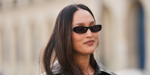 Australian designer Nicole Warne was seen wearing black Saint Laurent Sun SL 557 Shade 001 sunglasses during Paris Fashion Week Fall/Winter 2026.