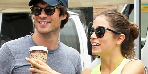 Nikki Reed, pictured on the right with husband Ian Somerhalder, was seen wearing black Persol 3355S 95/58 Polarised sunglasses