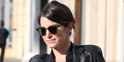 Nikki Reed was seen wearing the iconic Ray-Ban Clubmaster 3016 W0365 Black half-rim sunglasses