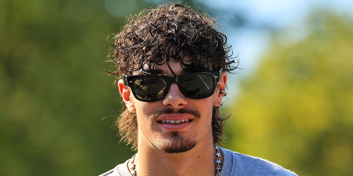 Bulgarian Formula 2 racer Nikola Tsolov was seen wearing black Ray-Ban Mega Wayfarer II RB 0832S 901/31 sunglasses at the F1 Italian Grand Prix 2026