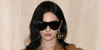 Chinese actress NingNing was seen wearing black Gucci GG2271S 001 shield sunglasses at the Gucci Fall/Winter 2026 fashion show during Milan Fashion Week.