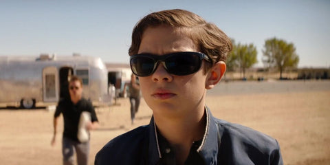 Young Noah Jupe was seen wearing black Ray-Ban Balorama 4089 601/58 Polarised sunglasses in 2019 movie Ford v Ferrari