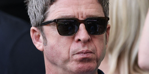 Noel Gallagher at Manchester City vs. Fulham football game wearing Oliver People's Lachman sunglasses