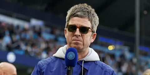Noel Gallagher was seen wearing brown tortoiseshell Oliver Peoples Lachman Sun OV5419SU 1677/P1 sunglasses with green Polarised lenses at the Premier League match in 2024. Shop online now on Pretavoir