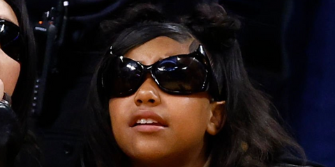 North West at Golden State Warriors Vs Los Angels Lakers basketball game April 9th 2024 wearing black Balenciaga sunglasses