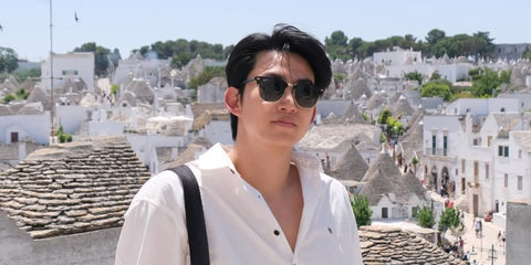 South Korean rapper Ok Taec-yeon of the group 2PM was seen wearing the iconic Ray-Ban Clubmaster 3016 W0365 Black sunglasses in Italy, shared through his Instagram post in July 2025.