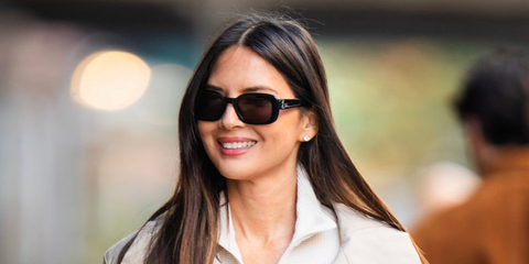 Olivia Munn was seen wearing black Saint Laurent Sun SL M130 001 sunglasses in New York City, November 2025.