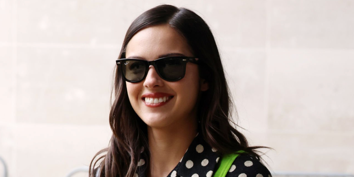 Olivia Rodrigo was seen wearing black Ray-Ban Wayfarer 2140 901/58 Polarised sunglasses at BBC Radio One promoting new album 'you seem pretty sad for a girl so in love' in London, June 2026.