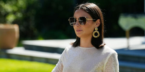 Television personality Paige DeSorbo was seen wearing gold Bottega Veneta BV1082SK 002 square sunglasses. Shop online now on Pretavoir