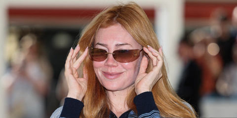 Russian-German television host Palina Rojinski was seen wearing gold Miu Miu MU A51S 5AK20P sunglasses with brown gradient lenses ahead of the Cannes Film Festival 2026.