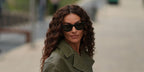 Italian model Paola Turani was seen wearing black Ray-Ban Mega Wayfarer RB 0840S 901/31 sunglasses at the Ermanno Scervino Spring/Summer 2025 fashion show during Milan Fashion Week. Shop online now on Pretavoir