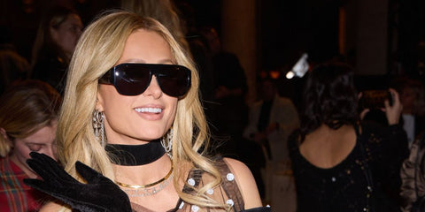 Paris Hilton was seen wearing black Isabel Marant IM 0239/S 807IR sunglasses at the Isabel Marant Spring/Summer 2026 fashion show during Paris Fashion Week. Shop online now on Pretavoir