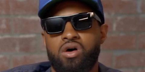 American basketball player Paul George was seen wearing black Prada PR 19WS 1AB5S0 square sunglasses in his podcast channel