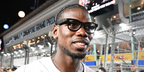 French footballer Paul Pogba sore matte black Ray-Ban Meta Wayfarer Gen 2 RW4012 601S/SB Smart Glasses at the F1 Singapore Grand Prix 2026.