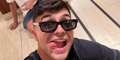 Spanish footballer Pedri Gonzalez of the Barcelona FC was seen wearing black Prada PR B11S 16K731 sunglasses in Japan, shared through his Instagram post in July 2025.