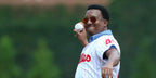 Dominican-American former baseball athlete Pedro Martinez was seen wearing gold Ray-Ban Aviator 3025 112/69 sunglasses with Orange Flash Mirror lenses
