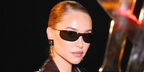 Fashion influencer Pernille Teisbaek wore black Saint Laurent Sun SL 807 002 sunglasses at the Saint Laurent Spring Summer 2027 show during Paris Fashion Week.