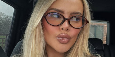 Content creator Perrie Sian was seen wearing striped brown Miu Miu MU 01XV 26E1O1 optical glasses in her Instagram post, March 2025.
