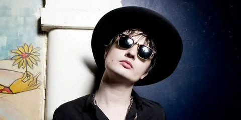 English musician Pete Doherty was seen wearing tortoiseshell Ray-Ban New Clubmaster RB 4416 710/51  half-rim sunglasses