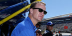Former American football quarterback was seen wearing the iconic black Ray-Ban New Wayfarer 2132 901/58 Polarised sunglasses at the 60th annual DAYTONA 500 in 2018