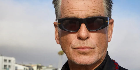 Pierce Brosnan was seen wearing black Bottega Veneta BV1144S 001 sunglasses in a GQ Magazine feature, September 2022. Shop online now on Pretavoir