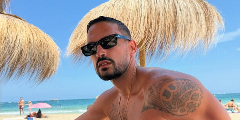 Italian internet influencer Pietro Tartaglione was seen wearing black Persol Adrien 3347S 95/31 sunglasses in Ibiza, shared through his Instagram post in July 2025.