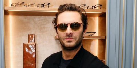 French actor Pio Marmai was seen wearing tortoiseshell and transparent brown Oliver Peoples OP-13 Sun OV5504SU 1754/52 at the opening of Oliver Peoples Paris store, September 2025. Shop online now on Pretavoir