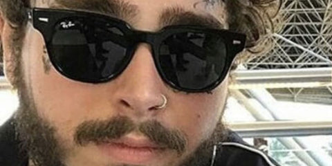 Post Malone is seen wearing Ray-Ban Meteor RB 2168 901/31 sunglasses in a social media post