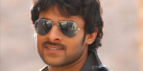 Bollywood actor Prabhas was seen wearing silver Ray-Ban Aviator Large Metal RB 3025 sunglasses with light blue lenses (not polarised). Shop online now on Pretavoir