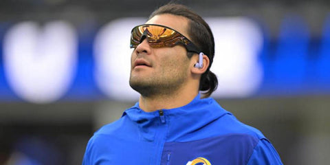 American football player Puka Nacua of Los Angeles Rams was seen wearing black Oakley Meta Vanguard OW8001 04 Smart Glasses with 24k prizm lenses.