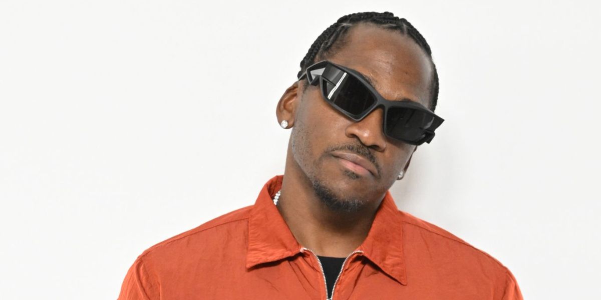 Rapper Pusha T was seen wearing black Givenchy Giv Cut GV40049I 02A sunglasses at the Givenchy Menswear Fall/Winter 2023 fashion show during Paris Men's Fashion Week