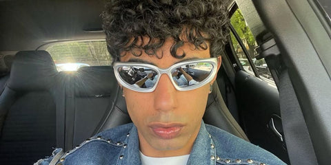 Italian rapper Pyrex was seen wearing grey silver Balenciaga BB0157S 004 sunglasses in his Instagram post, April 2023.