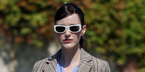 Rachel Brosnahan is seen wearing white Prada PR 14YS 1425S0 sunglasses to attend Venice Film Festival