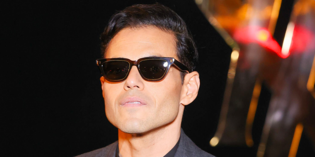 Rami Malek wore tortoise Saint Laurent Sun SL 462 Sulpice 008 sunglasses at the Saint Laurent Spring Summer 2027 show during Paris Fashion Week.
