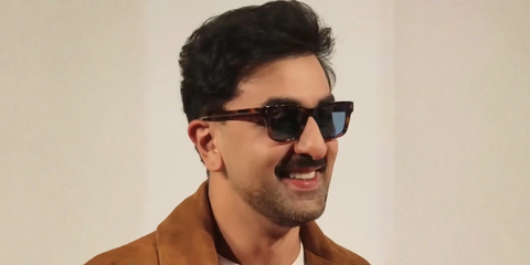 Bollywood actor Ranbir Kapoor was seen wearing tortoise Prada PR A17S 15W04D Polarised sunglasses with blue lenses at the opening of his lifestyle brand ARKS' New Delhi store.
