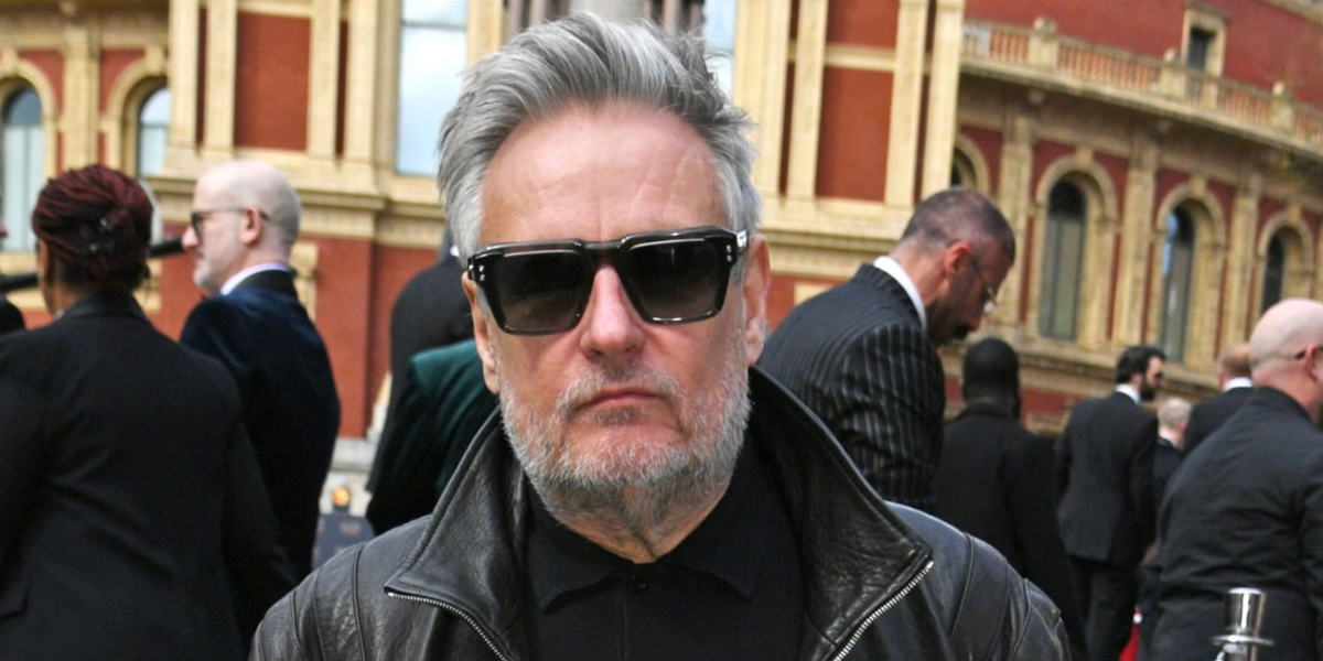 Photographer and director Rankin was seen wearing transparent grey Akoni Hercules AKS 105B sunglasses at The Olivier Awards 2026 in London.