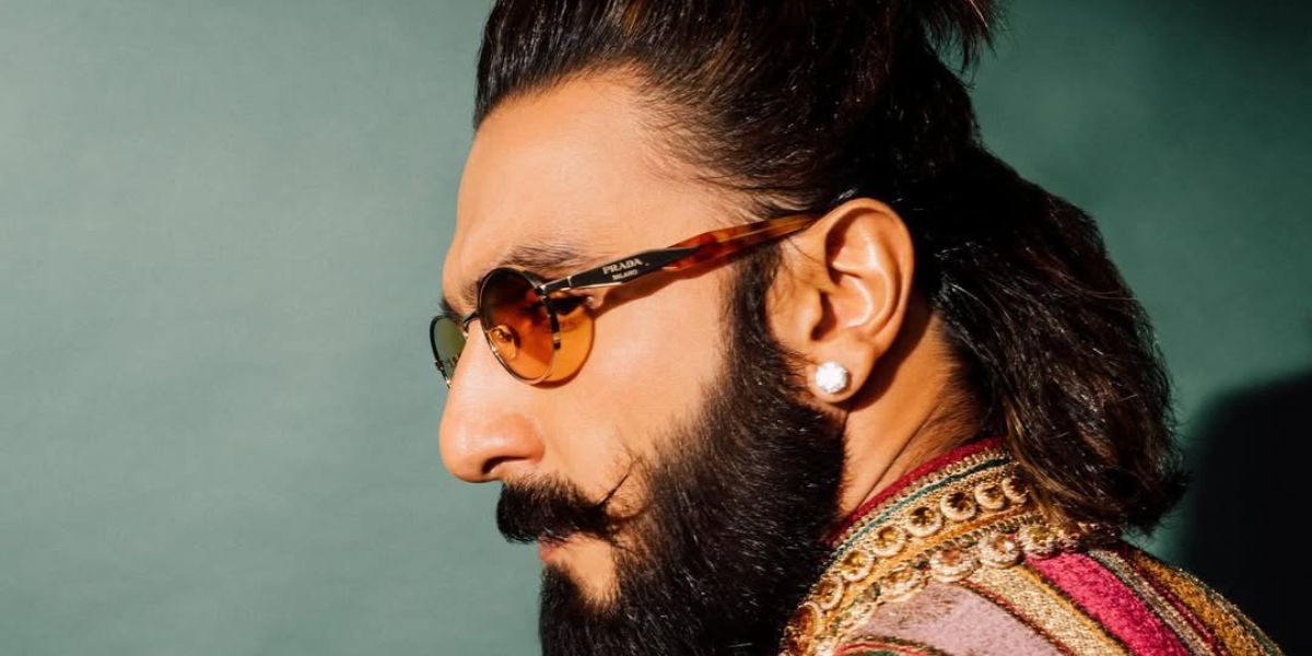 Bollywood actor Ranveer Singh was seen wearing gold Prada PR 65ZS ZVN70L round sunglasses in his Instagram post