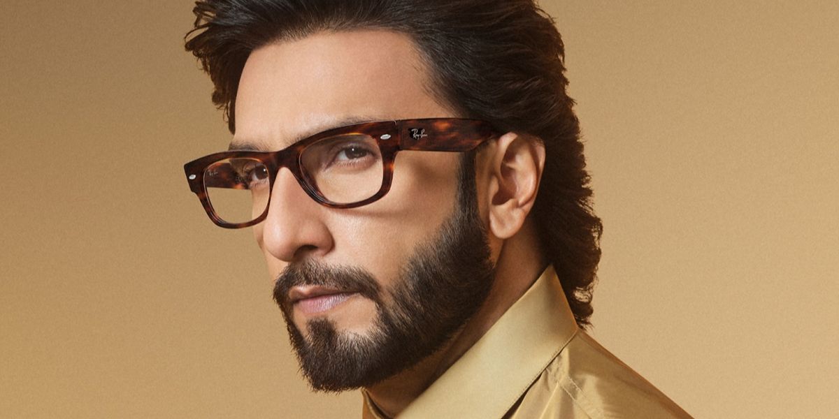 Bollywood actor Ranveer Singh wore tortoise Ray-Ban Mega Wayfarer II RB 0832V 2144 optical glasses in October 2026.