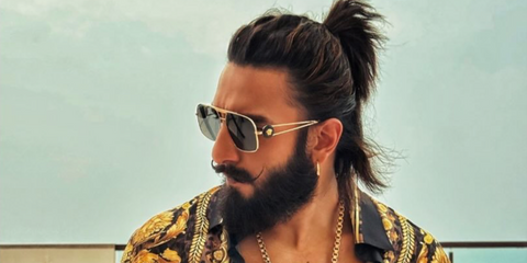 Bollywood actor Ranveer Singh was seen wearing gold Versace 2269 1002/87 aviator square sunglasses during his trip to Abu Dhabi, shared on Instagram