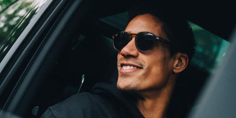 Raphael Varane wears Hugo Boss 1506/S 10AIR round sunglasses in his Instagram post