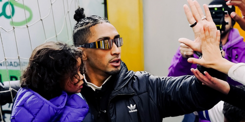 Brazilian footballer Raphinha was seen wearing silver Balenciaga BB0041S 002 wraparound sunglasses in his Instagram post, July 2025. Shop online now on Pretavoir