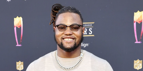 American football player Rashan Gary of the Green Bay Packers was seen wearing dark tortoiseshell and silver Ray-Ban Clubmaster Optical RB 5154 2012 glasses at the 11th Annual NFL Honors, February 2022.