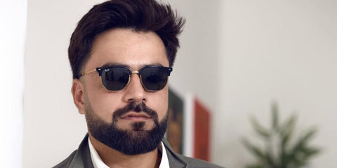 Afghan cricketer Rashid Khan was seen wearing black and gold Ray-Ban New Clubmaster RB 4416 601/31 sunglasses in his Instagram post, September 2024.