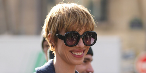 Actress Rebecca Hall was seen wearing black Chloe CH0153S 001 sunglasses with red gradient lenses at the Chloé Fall/Winter 2023 fashion show during Paris Fashion Week