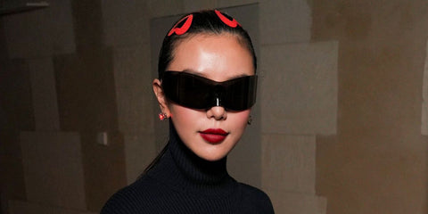 Singaporean actress Rebecca Lim was seen wearing black Balenciaga BB0299S 001 sunglasses at the Balenciaga Spring/Summer 2026 fashion dhow during Paris Fashion Week.